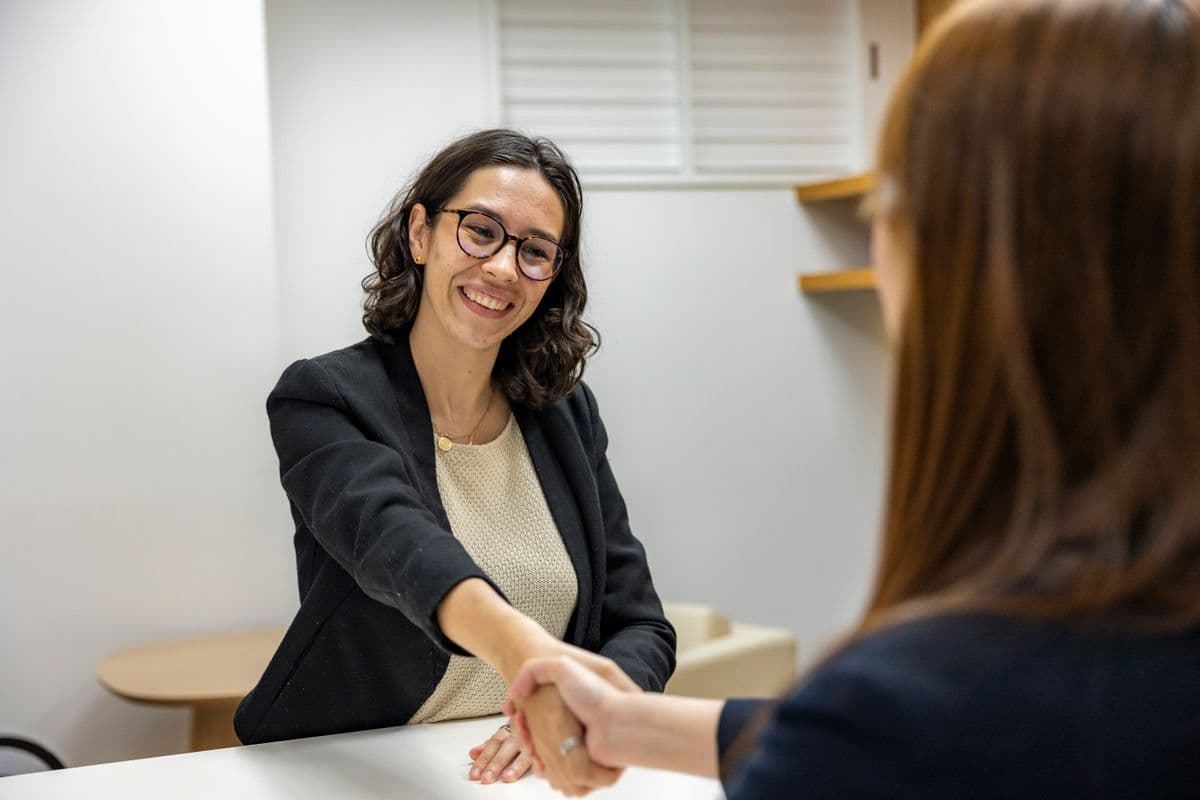 Two professionals shaking hands